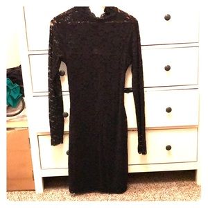 Black lace open back and high neck dress